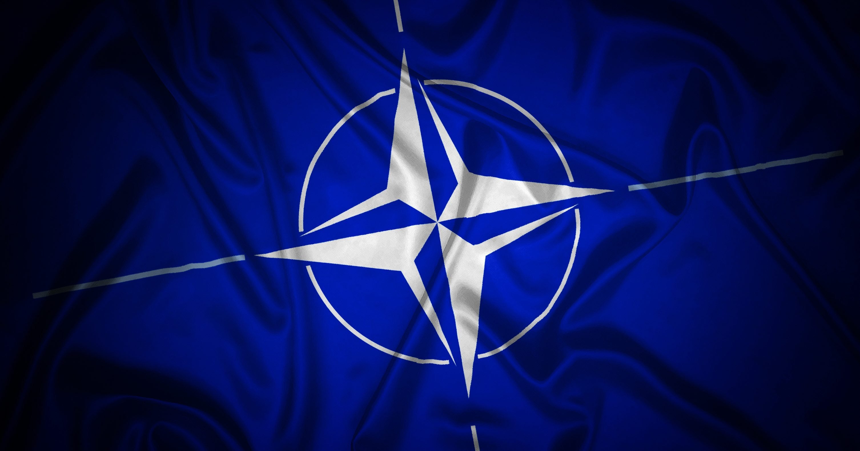 Нато 32. Североатлантический Альянс НАТО. Североатлантический Альянс НАТО флаг. Флаг Североатлантического Альянса. Союз НАТО.