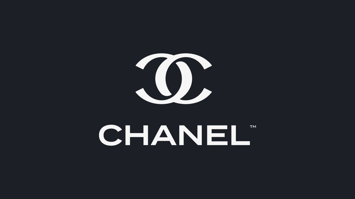 Круг шанель текст. Шанель бренд. Шанель лого. Chanel логотип. Коко Шанель логотип.